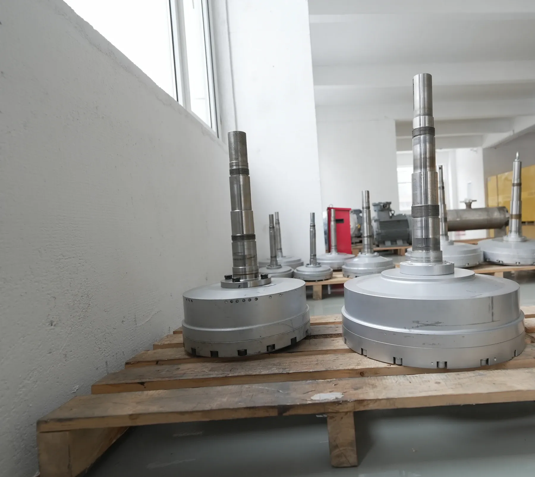 Rotary jet pump rotor assemblies with their drive shafts.